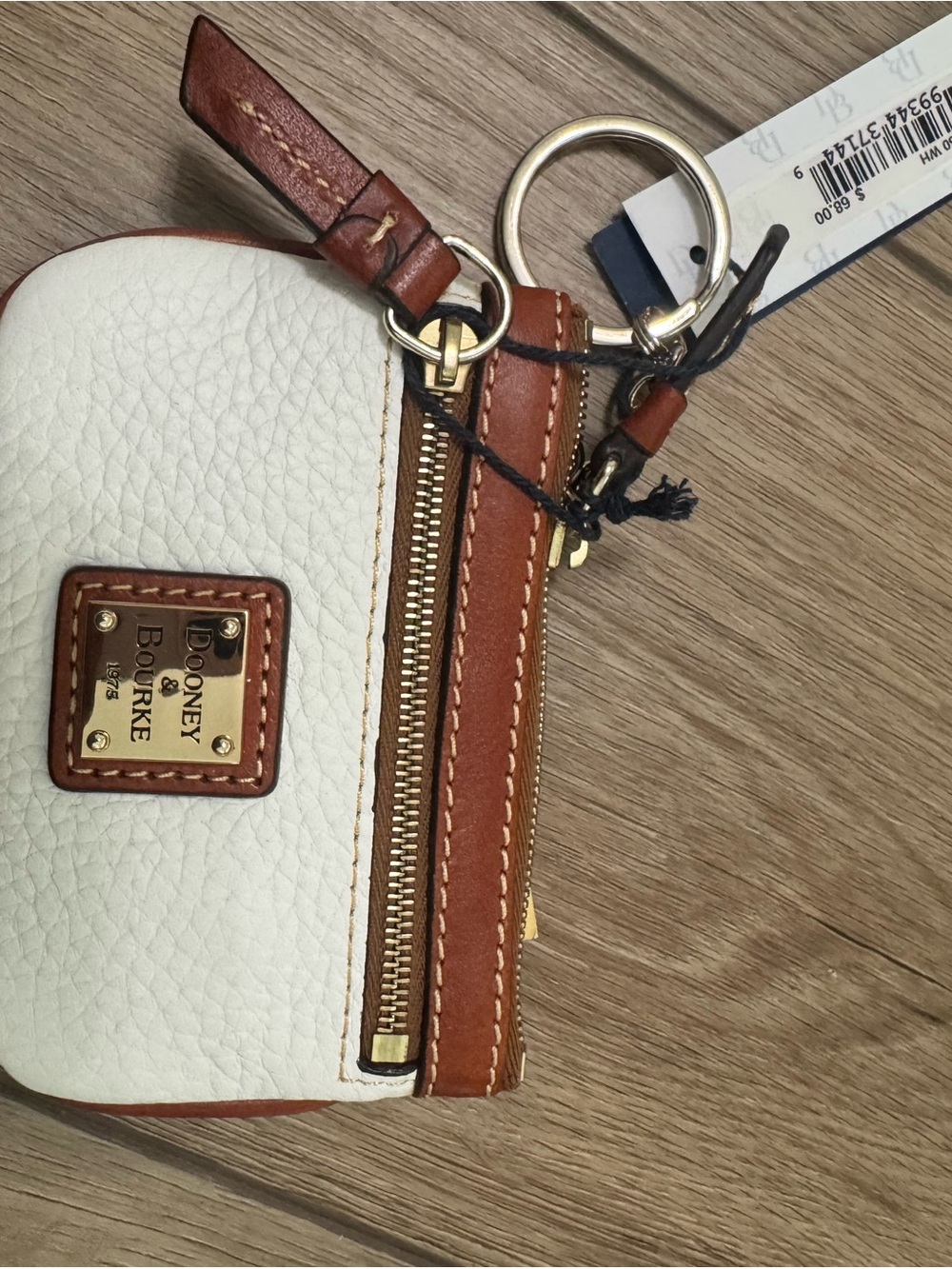 Dooney & Bourke White and Brown Pebble Leather Mini Wristlet